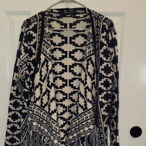 Southwest inspired, navy and cream print with fringe tassels and buttons